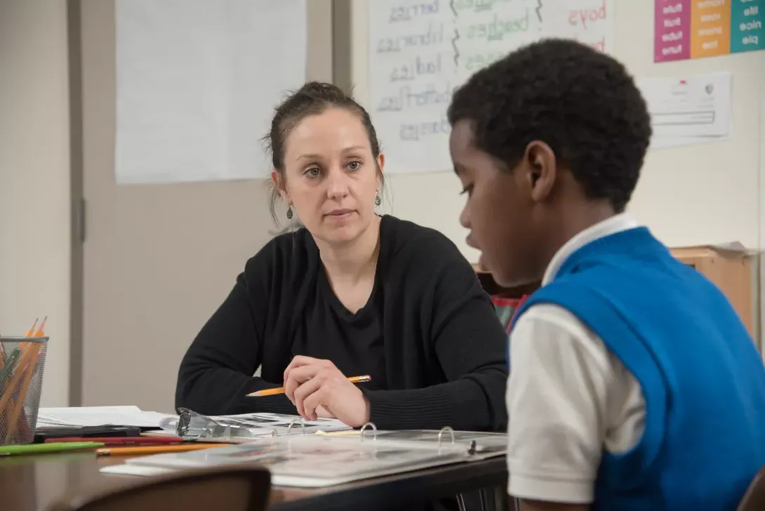 Student teacher working with a student